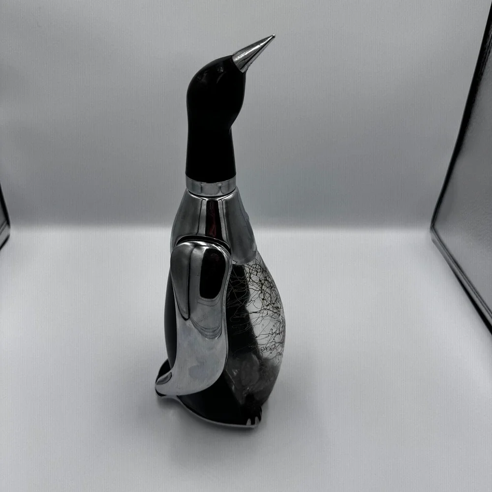 PENGUIN BOTTLE DECANTER MUSIC BOX PLAYS
